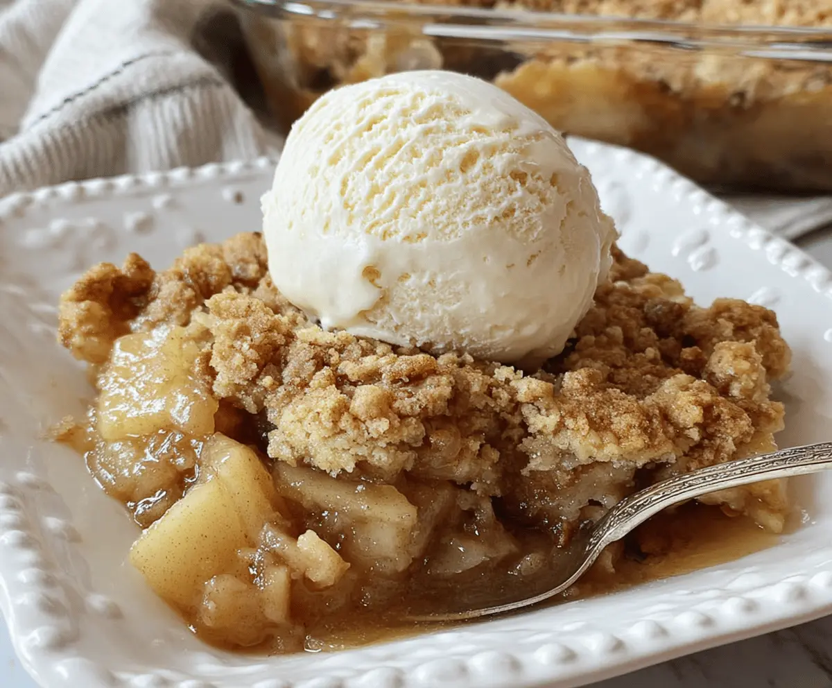 Delicious homemade apple pie dump cake with golden crust and spiced apple filling ready to serve