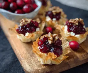 Delicious goat cheese cranberry phyllo cups served as an elegant appetizer