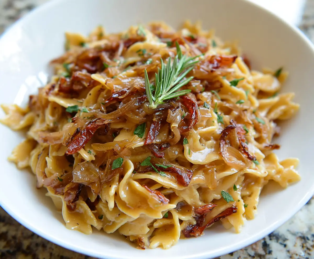 Delicious caramelized onion pasta served with rich, golden-brown onions and perfectly cooked pasta.