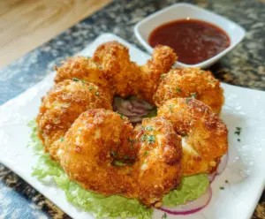 Delicious Copycat Chicken Ring on a plate, crispy and golden, perfect for snacking or appetizer.
