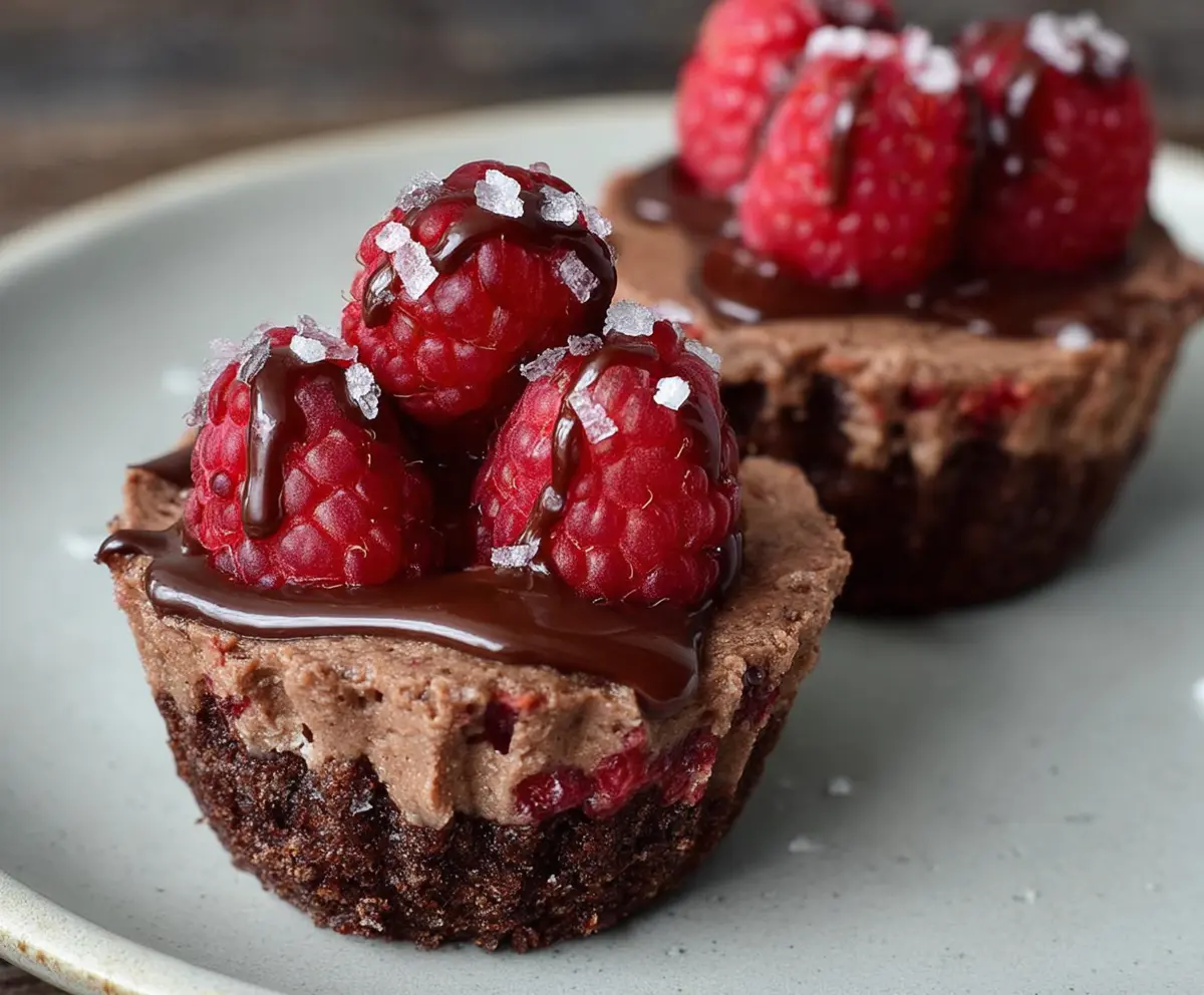 Delicious Marry Me Raspberry Chocolate Mousse Cups in elegant glass serving cups.