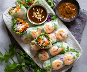 Fresh shrimp rice paper rolls packed with vegetables and herbs, perfect for a healthy appetizer.