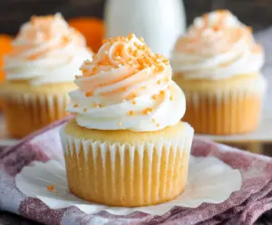 Delicious orange creamsicle cupcakes topped with sweet frosting and vibrant citrus flavor.